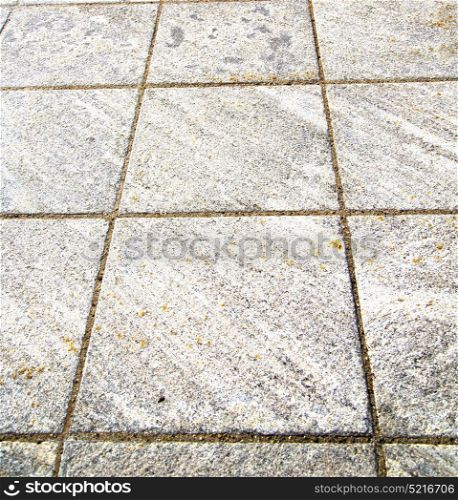 brick in legnano street lombardy italy varese abstract pavement of a curch and marble