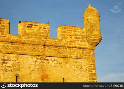 brick in old construction africa morocco and the tower near sky