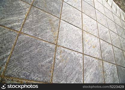 brick in the cadrezzate street lombardy italy varese abstract pavement of a curch and marble