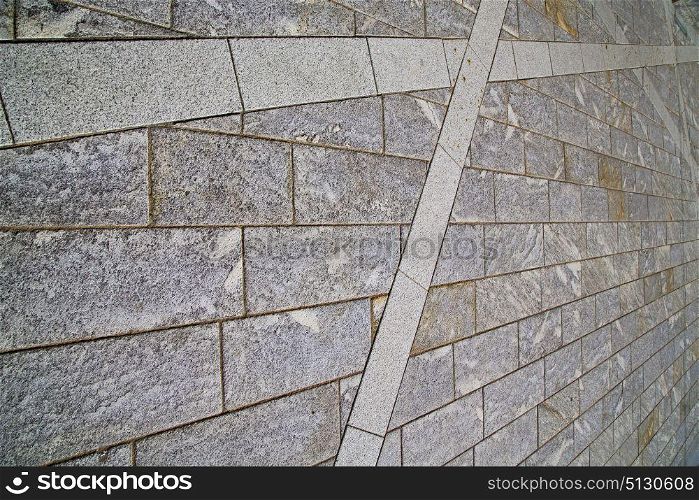 brick in the casorate sempione street lombardy italy varese abstract pavement of a curch and marble