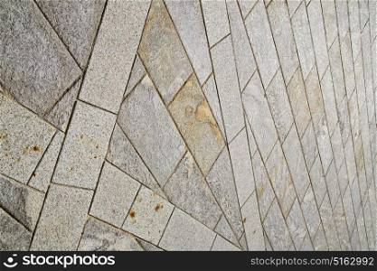 brick in the casorate sempione street lombardy italy varese abstract pavement of a curch and marble