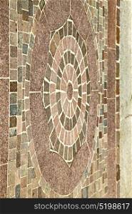 brick in the castellanza street lombardy italy varese abstract pavement of a curch and marble