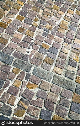 brick in varano borghi street lombardy italy varese abstract pavement of a curch and marble