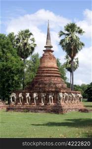 Brick pagoda with elphants in old Sukhotai, Thailand