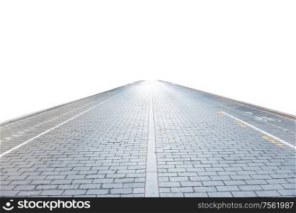 Brick road on empty city street isolated on white background