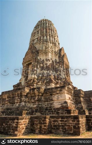 Brick ruins of main prang of ancient buddhist temple Wat Ratchaburana. Ayutthaya historical park, Thailand