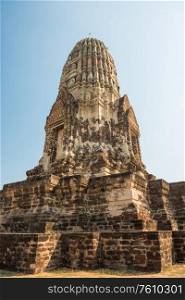 Brick ruins of main prang of ancient buddhist temple Wat Ratchaburana. Ayutthaya historical park, Thailand