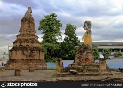 Brick stupa and Buddha in Ayutthaya