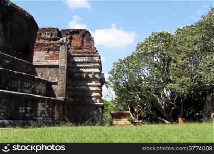 Brick stupa and magnolia tree in Mihintale, Sri Lanka