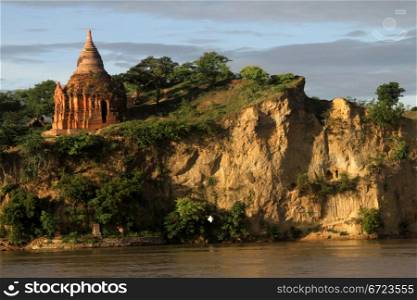 Brick stupa on the bank of river in Bagan, Myanmar