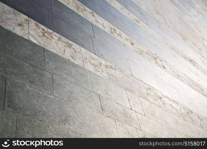 brick the in busto arsizio street lombardy italy varese abstract pavement of a curch and marble