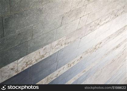 brick the in busto arsizio street lombardy italy varese abstract pavement of a curch and marble