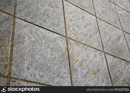brick the in cadrezzate street lombardy italy varese abstract pavement of a curch and marble