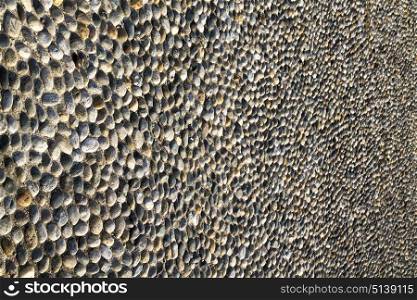 brick the in mozzate street lombardy italy varese abstract pavement of a curch and marble