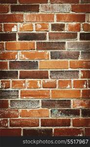 Brick wall background. Red and brown brick background of grungy wall