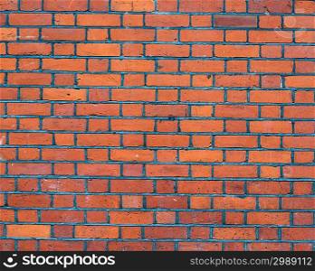 Brick wall background with red bricks