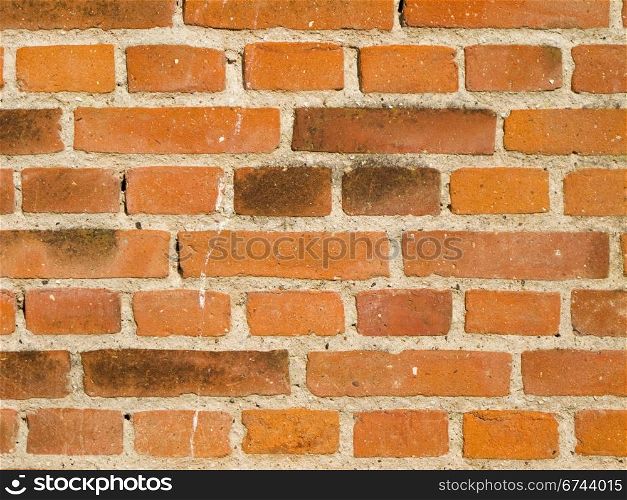 brick wall weathered closeup. closeup of a weathered brickwall in sunlight