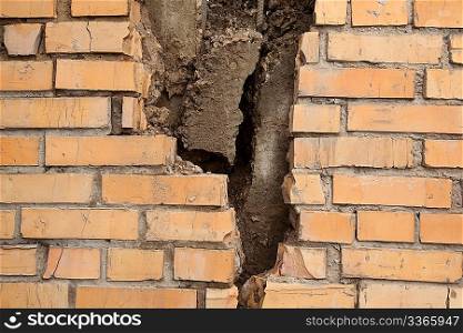 Brick wall with breach