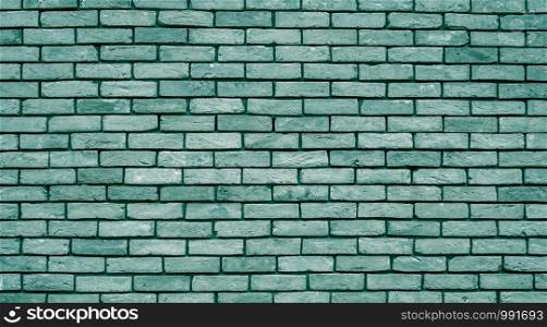 Brick wall with mint color masonry. Wall with small Bricks. Modern wallpaper design for web or graphic art projects. Abstract template or mock up.