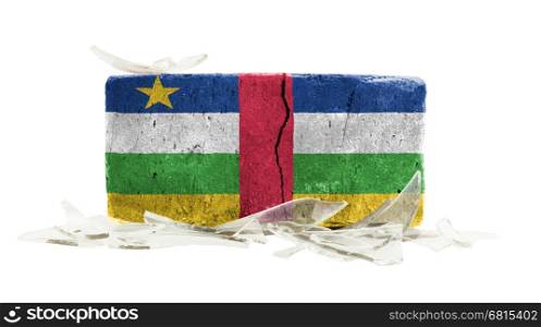 Brick with broken glass, violence concept, flag of the Central Africal Republic