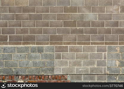 brickwork background texture with different shapes and colors of bricks