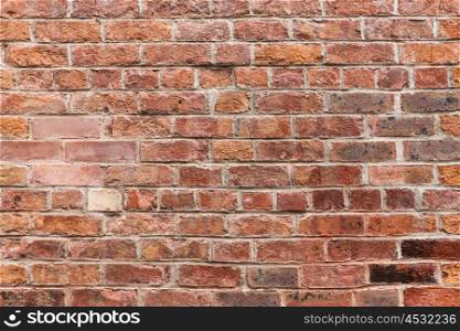brickwork, masonry, building and textures concept - close up of red brick wall background