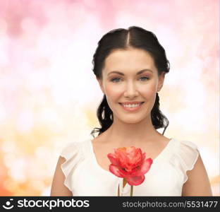 bridal and beauty concept - young and beautiful woman with flower