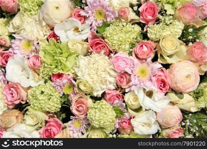Bridal arrangement in green, pink and white, mixed flowers