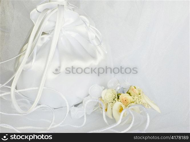 bridal bag wedding flowers decorations over bridal veil