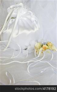 bridal bag wedding flowers decorations over bridal veil