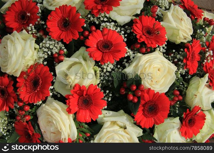 Bridal bouquet in red and white: gerberas, roses and gypsophila