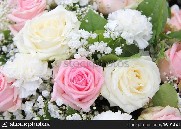 Bridal flower arrangement, roses and carnations in pink and white