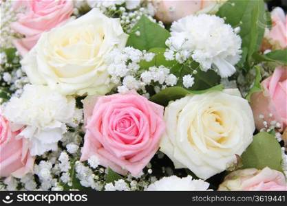 Bridal flower arrangement, roses and carnations in pink and white