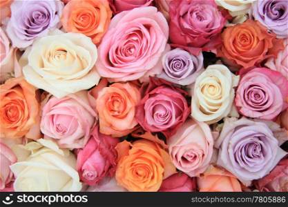 Bridal flower arrangement with roses in many pastel colors