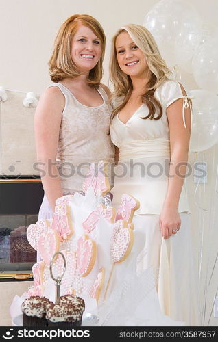 Bride and Friend standing Together at Bridal Shower