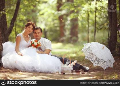 bride and groom at a wedding in summer nature