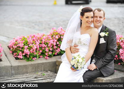 Bride and groom in park. couple on their wedding day