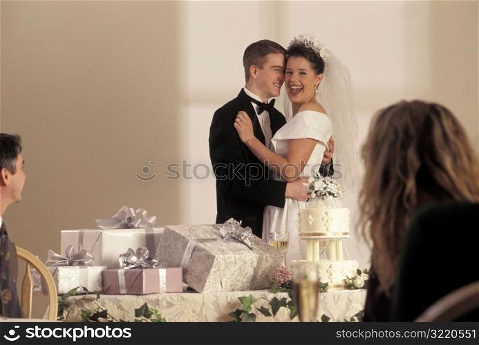 Bride And Groom Laughing At Wedding Reception