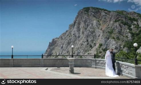 bride and groom on the terrace in Foros, Crimea, Ukraine