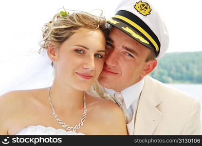 bride and groom posing to camera