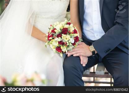 Bride and groom's hands at wedding ceremony&#xA;