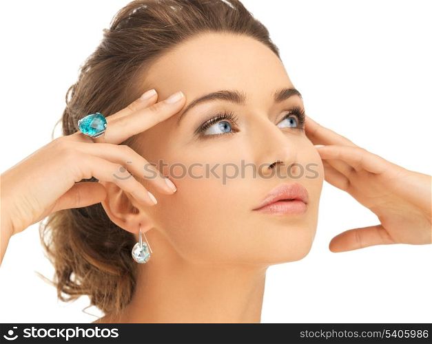 bride and wedding concept - beautiful woman with blue cocktail ring
