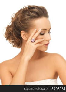 bride and wedding concept - beautiful woman with purple cocktail ring