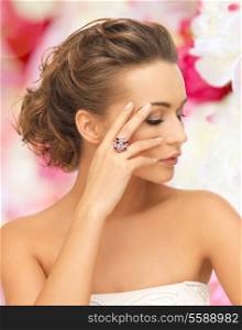 bride and wedding concept - beautiful woman with purple cocktail ring