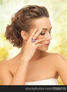 bride and wedding concept - beautiful woman with purple cocktail ring