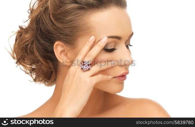 bride and wedding concept - beautiful woman with purple cocktail ring. woman with purple cocktail ring