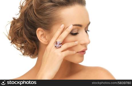 bride and wedding concept - beautiful woman with purple cocktail ring. woman with purple cocktail ring