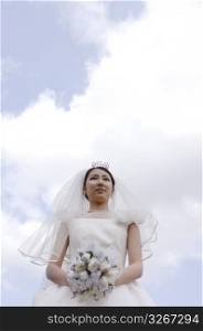 Bride below the blue sky