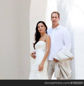 bride couple just married in mediterranean arches