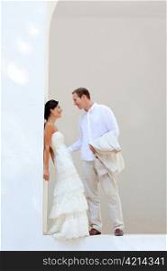 bride couple just married in mediterranean arches